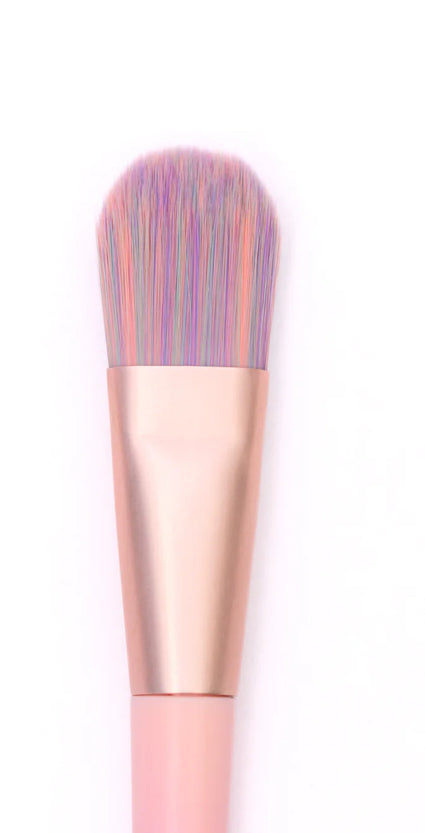 Unicorn bronzer brush with pastel bristles and rose gold ferrule for precise blending and bronzer application